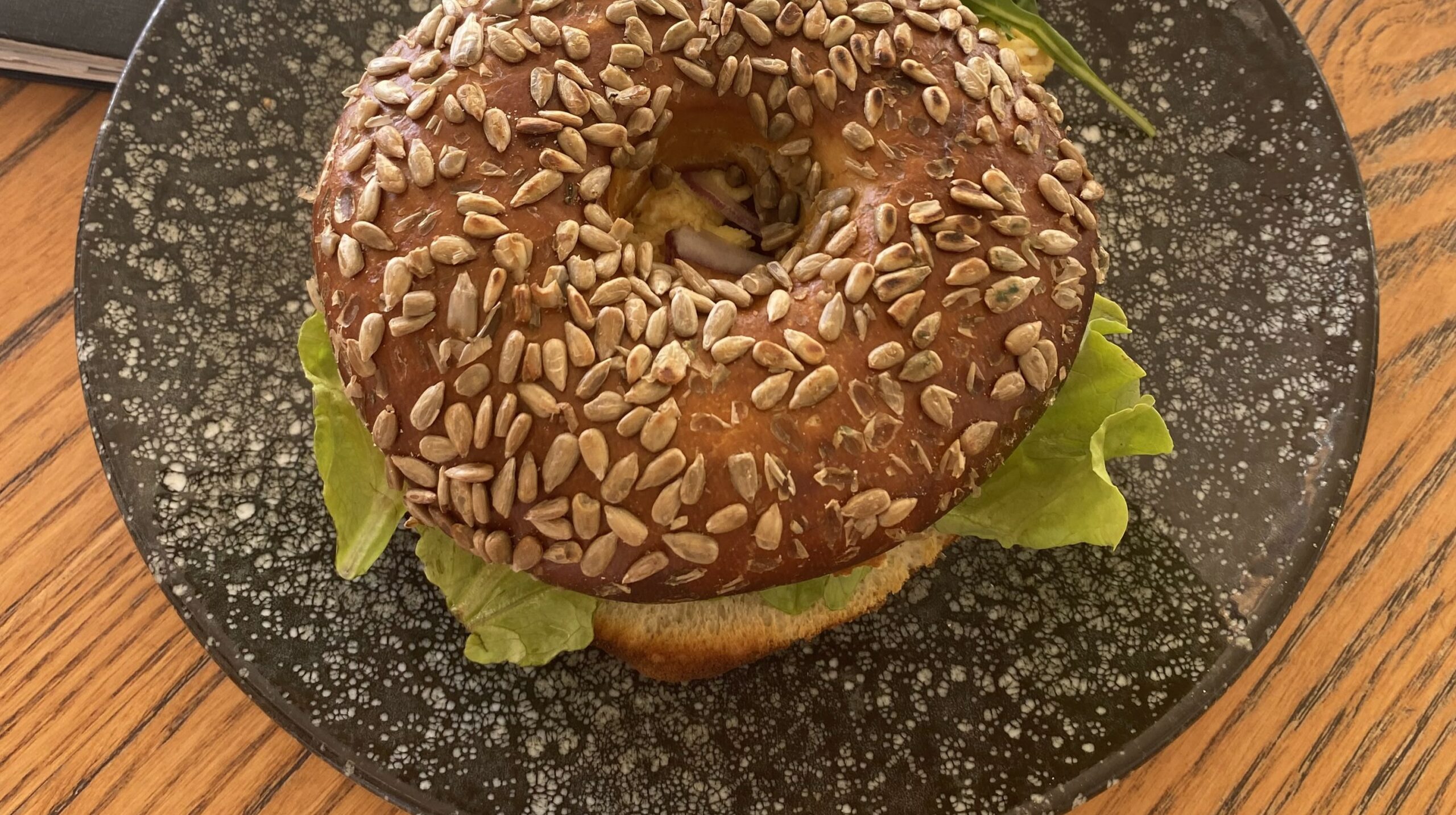 Wholegrain bagel laying on the table