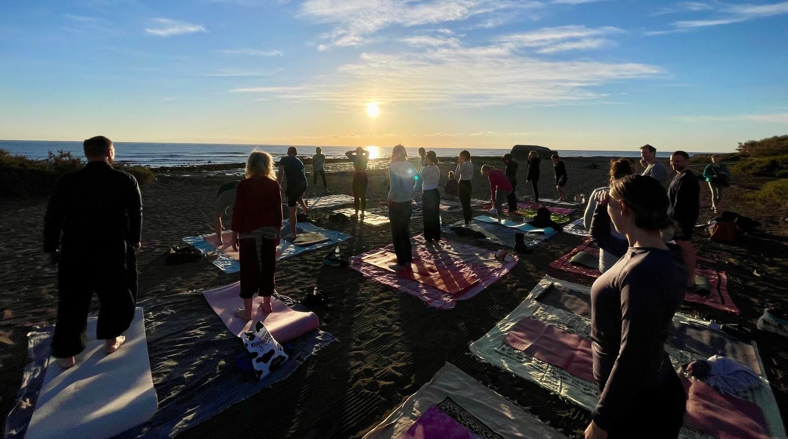 Yoga class on the beach